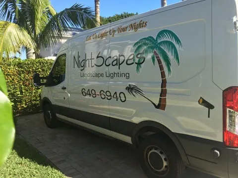 A NightScapes Landscape Lighting van at a client property